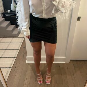 Black velvet mini skirt
